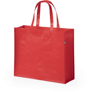 A red reusable grocery bag with two handles and a branding logo.