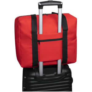 A red wheeled bag with a black handle, featuring a zippered front pocket.