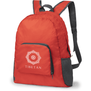 A foldable backpack in bright red with grey accents and a front pocket, featuring a logo.