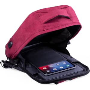 A red anti-theft backpack with a spacious interior, featuring a compartment for a tablet and a logo.