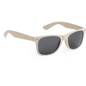 A pair of light beige sunglasses with dark lenses and a logo on the side.