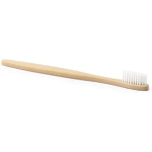 A bamboo toothbrush with a simple design and white bristles. It features a logo on the handle.