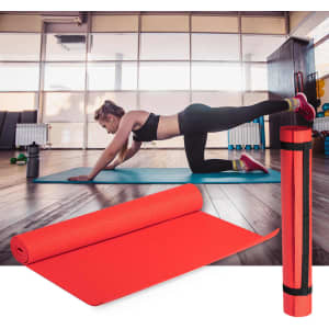 A red fitness mat is displayed rolled and unrolled, with a woman exercising on a blue mat in a gym setting.