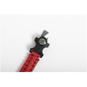 A red multifunction arm strap featuring a black clip and a built-in compass. It also has a branding logo.