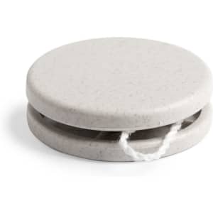 A grey yo-yo with a simple design and a white string, featuring a logo on the side.