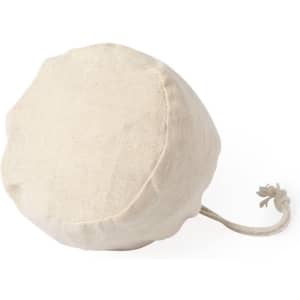 A beige foldable bag with a rounded shape and a drawstring closure. It has a simple design and texture.