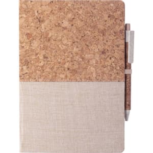 A notepad with a cork exterior and a light fabric bottom, featuring a pen attached on the side.