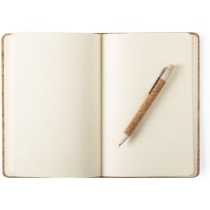A notebook with plain pages and a cork-handled pen resting on it. The notebook has a brown cover.
