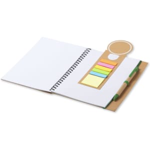 A ruler bookmark in natural and pastel colours attached to a spiral notebook with blank pages and sticky notes.