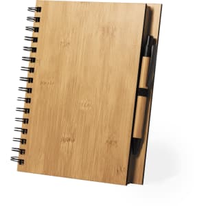 A bamboo notebook with a wire spiral binding and a matching pen attached to the side.