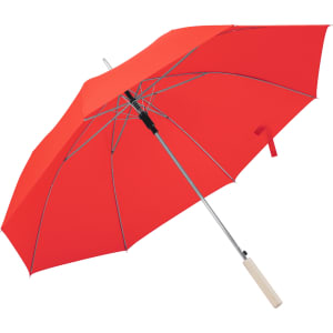 A bright red umbrella with a chrome frame and a light-coloured handle, featuring a logo on the canopy.