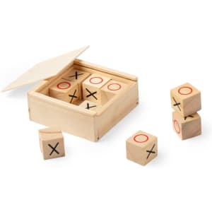 A wooden box containing game cubes with X and O markings in red against a natural wood finish.