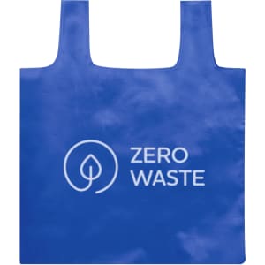A blue foldable bag with a logo featuring a leaf and the words "ZERO WASTE".