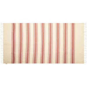 A striped towel pareo in cream and rust colours with fringed edges, featuring a logo.