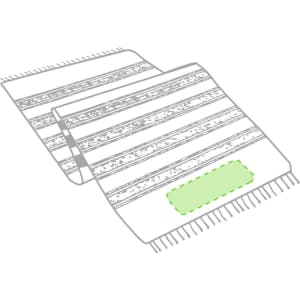 A patterned towel pareo in neutral tones with fringed edges. It features a logo in one area.