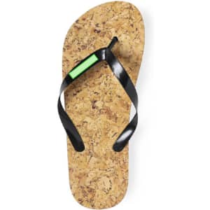 A pair of Sebrin flip flops featuring a cork footbed and black straps with a green accent.