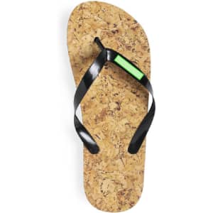 A cork flip flop with black straps and a small green accent, featuring a logo on the strap.