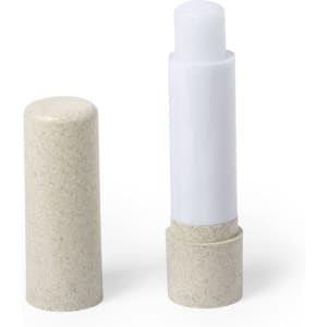 A lip balm with a white tube and a textured beige cap. The product has a minimalistic design and features a logo.