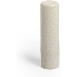 A cylindrical lip balm container in a light grey colour with a textured finish and a logo.