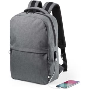 A grey backpack with a USB charging port, featuring padded shoulder straps and a front pocket.