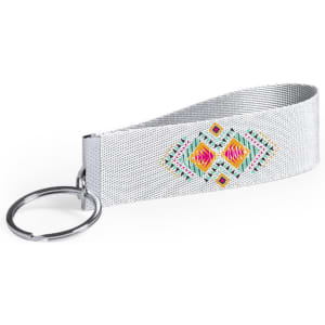 A silver keyring with a decorative patterned strap and a circular metal ring.