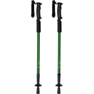 A pair of green walking poles with black grips and adjustable straps, featuring rubber tips for stability.