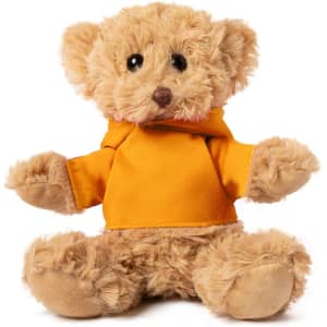 A fluffy tan teddy bear wearing a bright orange hoodie, featuring round black eyes and a cute expression.