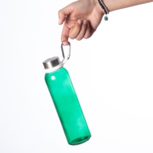 A green drink bottle is held by a hand, featuring a silver cap and a metal clip for attachment.