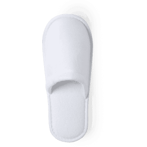 A white slipper featuring a soft, plush design and an open-toe style. It has a logo on the side.