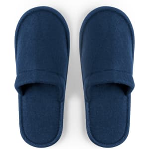 A pair of navy blue Tarkun slippers featuring a soft, padded design with an open toe and a logo.