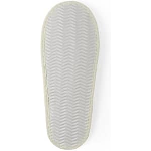 A pair of Nalton Slippers featuring a light-coloured sole with a zigzag pattern and a simple design.