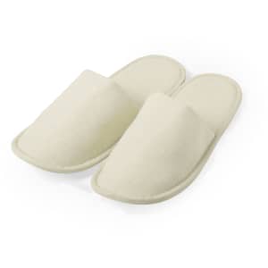 A pair of cream-coloured Nalton Slippers with a simple design and soft texture. The slippers have a logo on them.