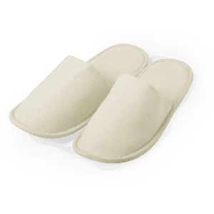 A pair of cream-coloured Nalton slippers with a simple, open-toe design and a subtle branding detail.