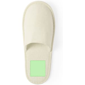 A pair of cream-coloured slippers with an open toe design and a square area for branding or customisation.