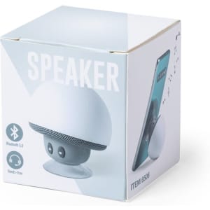 A compact, round white speaker inside a square box featuring a logo and Bluetooth details.