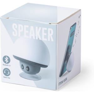 A white packaging box featuring a Bluetooth speaker design, showcasing a rounded top and a base. The box includes a logo.