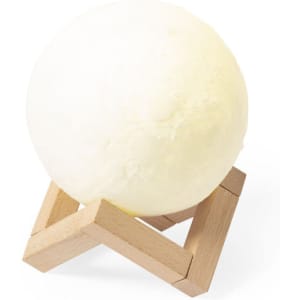 A white spherical lamp displayed on a wooden stand, showcasing a minimalist design.