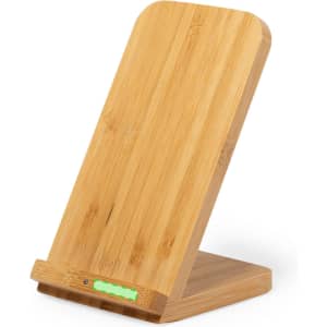 A wireless charger made of bamboo, featuring a sleek design with a green indicator light.