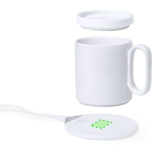 A white mug and matching lid sitting on a circular wireless charger, featuring a logo.