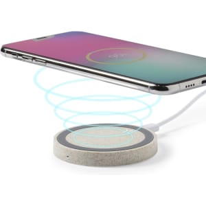 A wireless charger in grey with a smartphone above it, displaying charging indicators in vibrant colours.