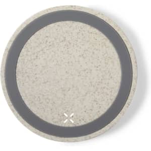 A circular wireless charger in a light speckled grey design with a dark grey border and a logo.