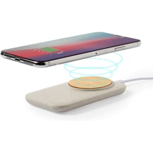 A wireless charger in a light grey colour with a circular charging pad. A smartphone hovers above it, showing battery status.