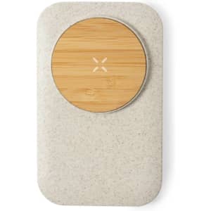 A wireless charger in light grey with a circular bamboo charging surface and a simple, smooth design.