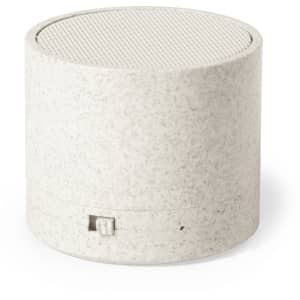 A round, white speaker with a textured surface and mesh top. It features a small logo on the side.