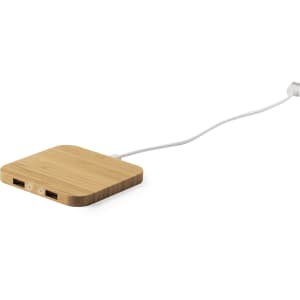 A wireless charger with a bamboo finish and a white cable, featuring two USB ports.