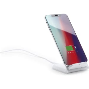 A wireless charger in white, with a smartphone displaying a charging indicator, set on a sleek stand.