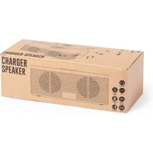 A brown cardboard box containing a wireless charger speaker with circular speaker grilles and branding.