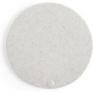 A round, speckled white pocket mirror with a smooth surface and a small logo at the bottom.