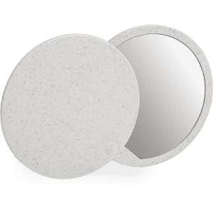 A white speckled pocket mirror with a round shape, featuring a reflective surface and a hinge for opening.