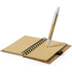 A spiral-bound notebook with a brown cover and lined pages, accompanied by a plain pen placed on top.
